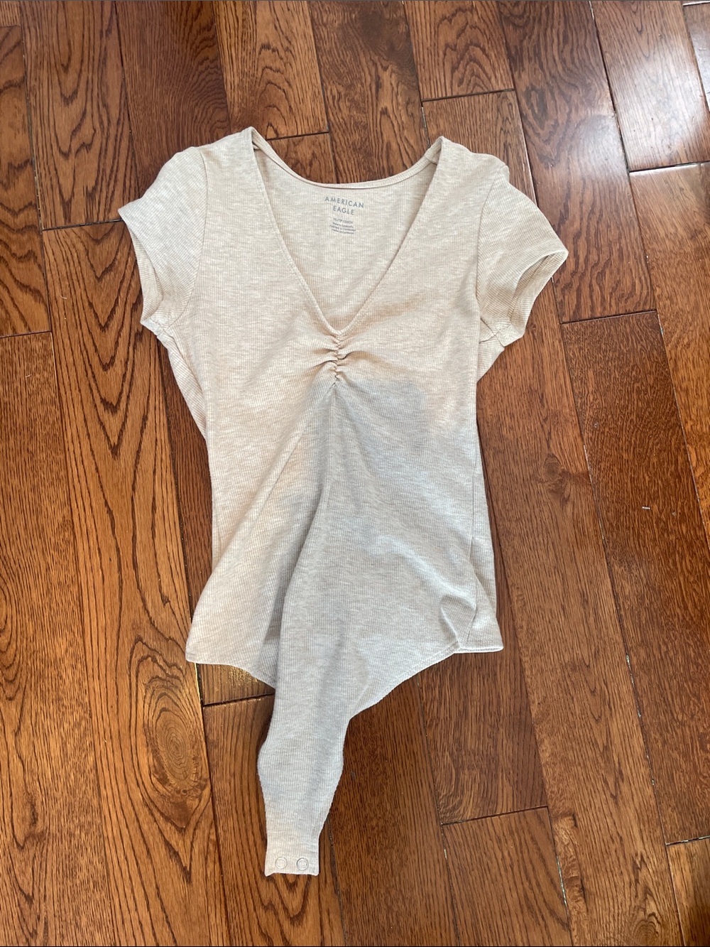 American Eagle Outfitters Light Cream V-Neck Ruched Front Bodysuit